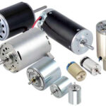 Brushed Coreless DC Motor diagram showing moving hollow coil cup, internal permanent magnet, and mechanical carbon brushes