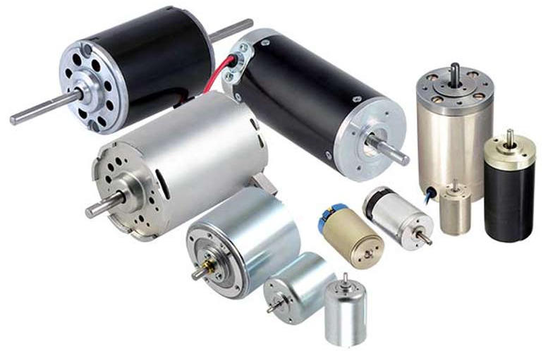 Brushed Coreless DC Motor diagram showing moving hollow coil cup, internal permanent magnet, and mechanical carbon brushes